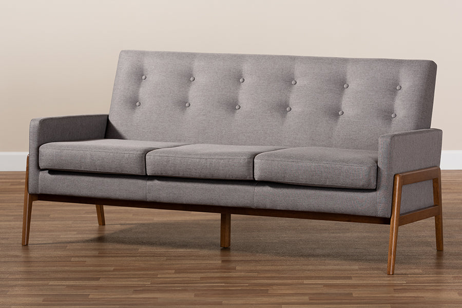Baxton Studio Perris Mid-Century Modern Light Grey Fabric Upholstered Walnut Finished Wood Sofa