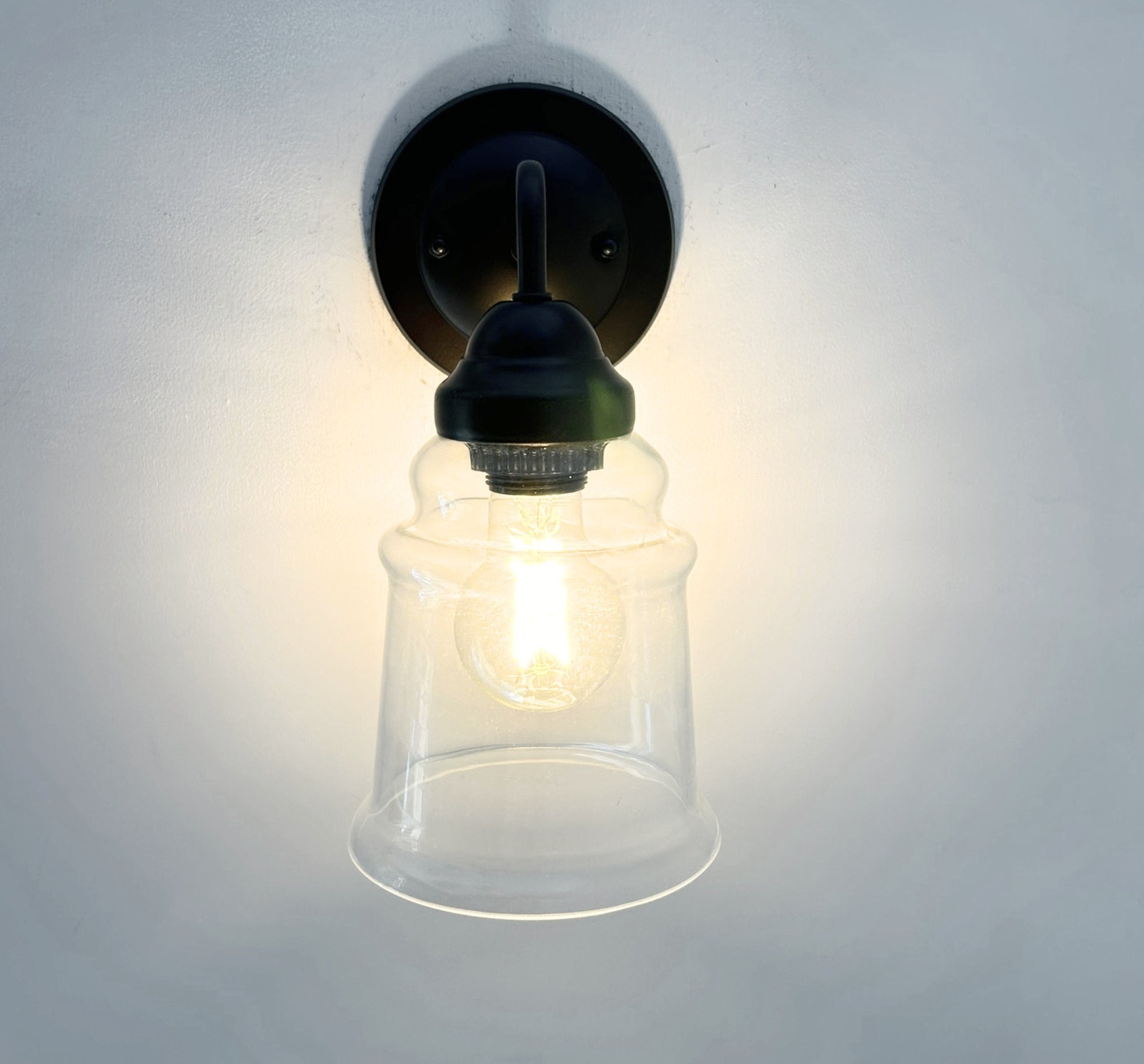 Clear Tiered Bell Wall Sconce