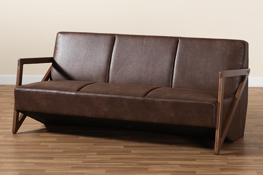 Baxton Studio Christa Mid-Century Modern Transitional Dark Brown Faux Leather Effect Fabric Upholstered and Walnut Brown Finished Wood Sofa
