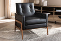 Baxton Studio Perris Mid-Century Modern Black Faux Leather Upholstered Walnut Wood Lounge Chair