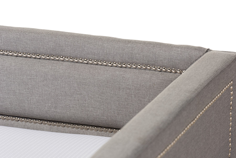 Baxton Studio Raymond Modern and Contemporary Grey Fabric Nail Heads Trimmed Sofa Twin Daybed with Roll-Out Trundle Guest Bed