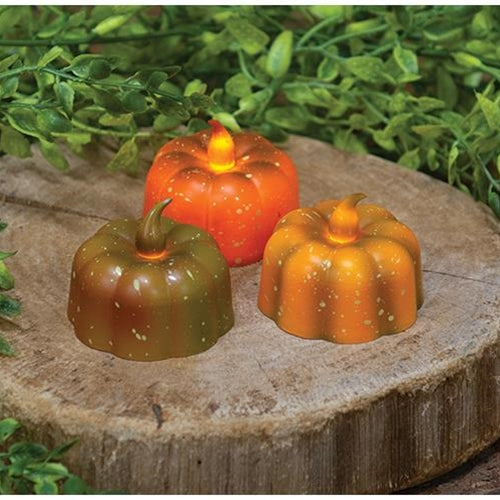 Pumpkin Tealight w/ Bulb. asst. (Pack of 4)